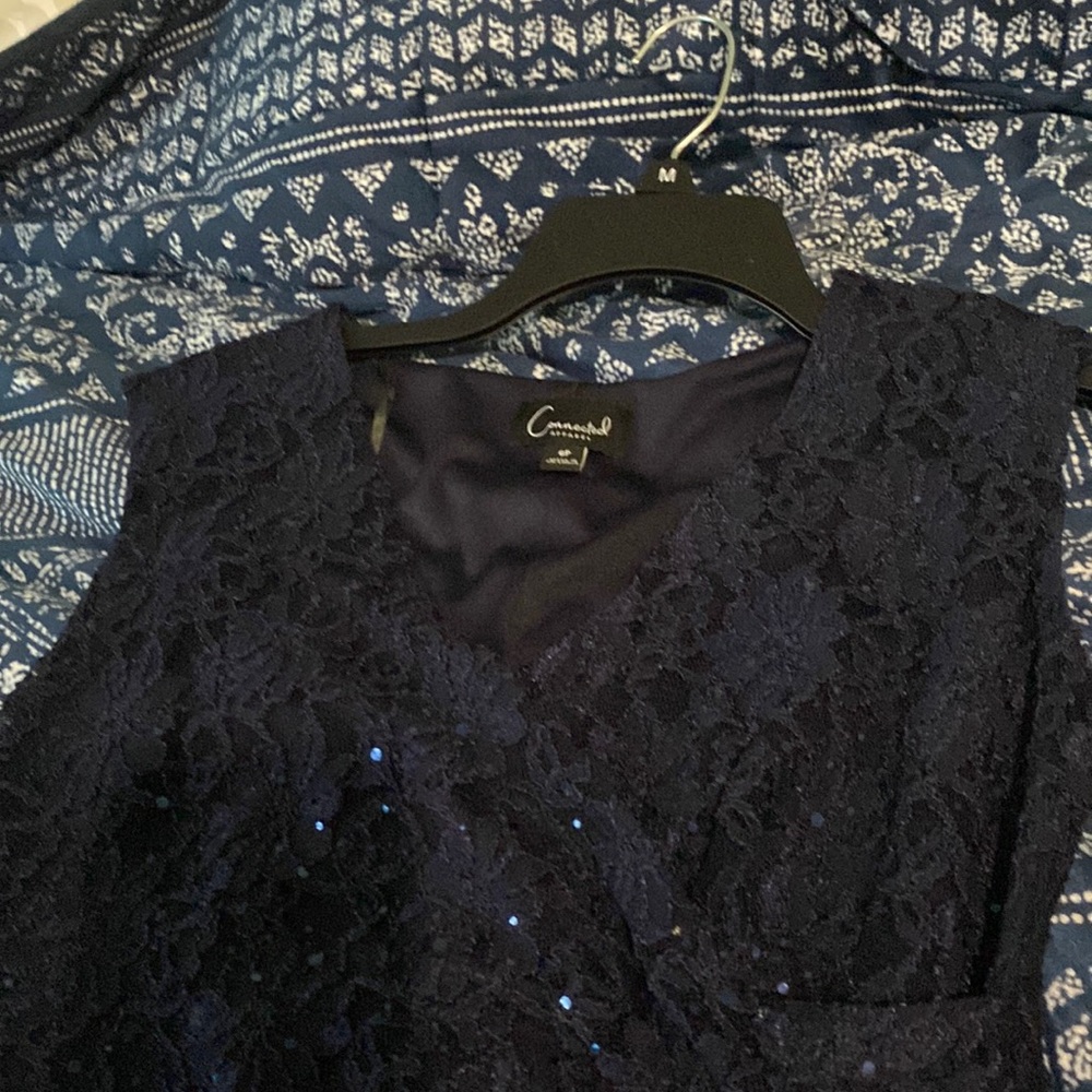 Full length navy lace and sparkling. Pull over fully lined and most comfortable.